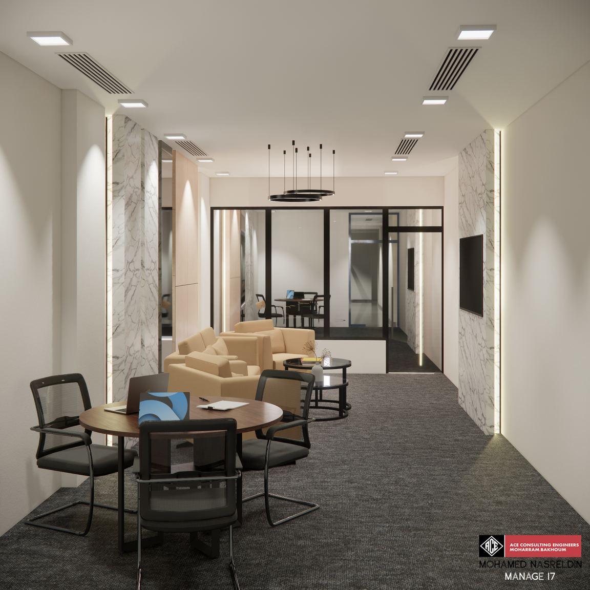 Open office with a round meeting table and lounge chairs