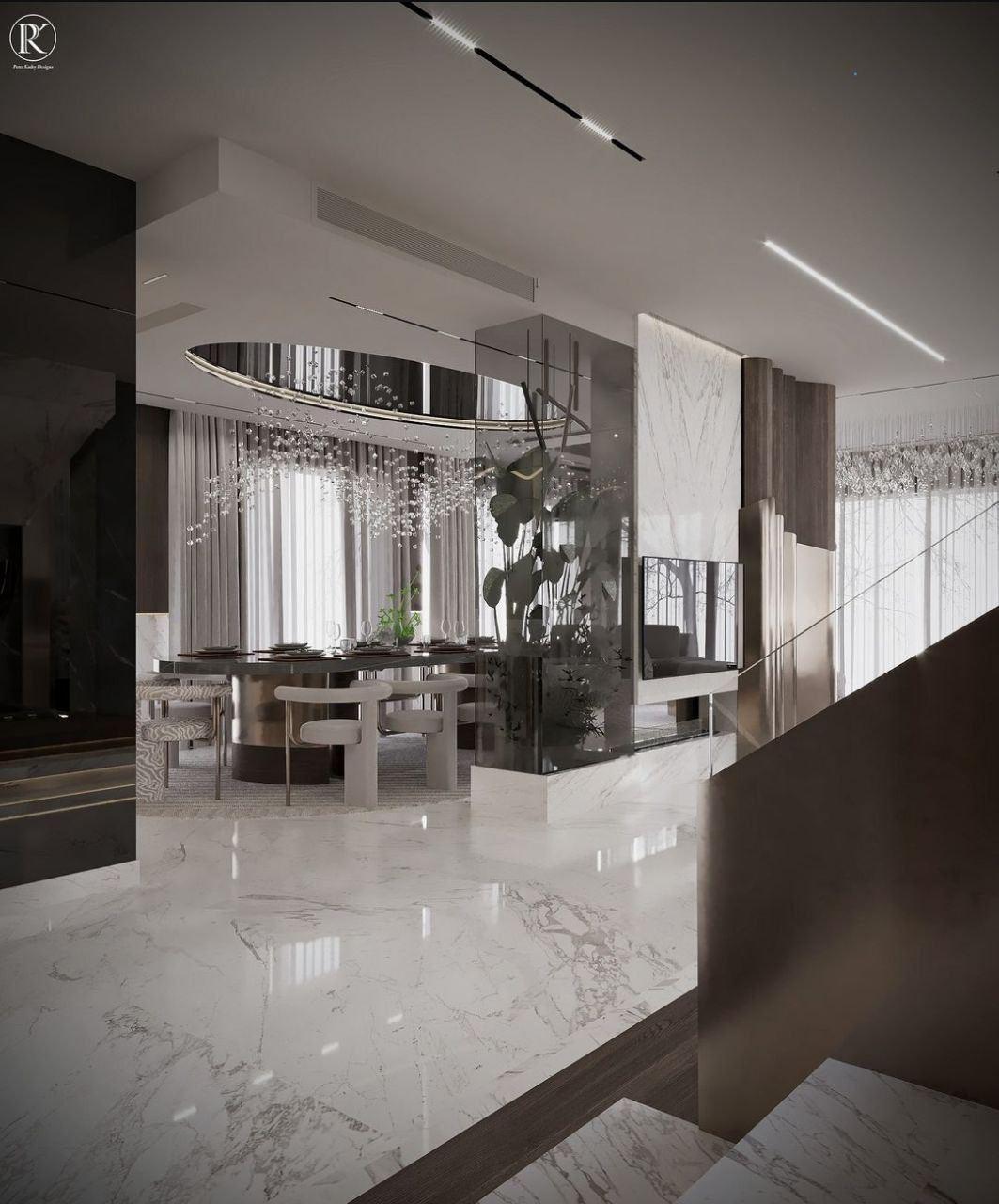 Dining room under a sculptural ceiling light